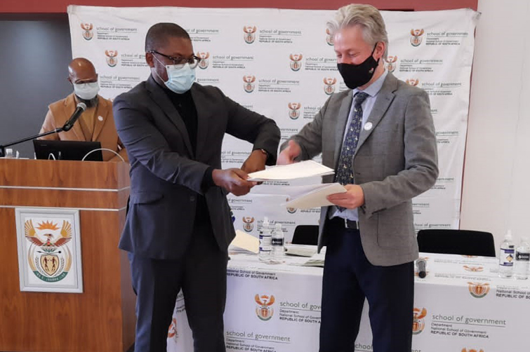Prof Philippe Burger (Vice-Dean in the Faculty of Economic and Management Sciences, UFS) and Mr Busani Ncgaweni (Principal, NSG) at the NSG signing ceremony in Pretoria, 3 June 2021.