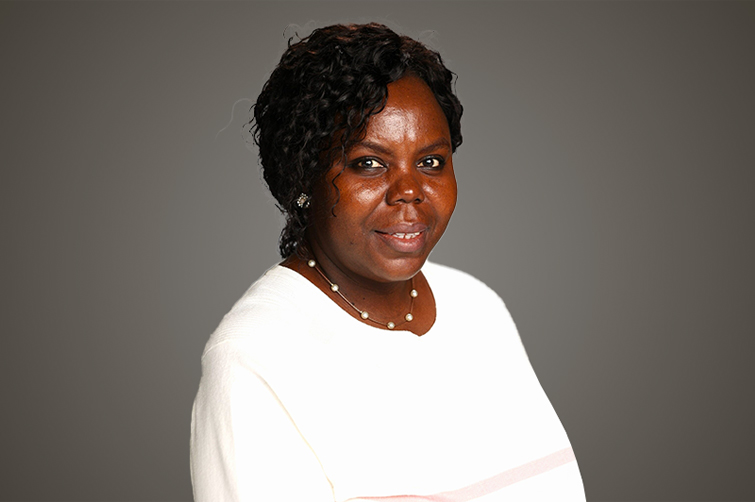 Prof Shola