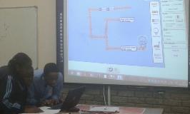 Learners benefitting from the SLP that their teacher attended. Here they are using simulation of an electric circuit to better understand the concepts