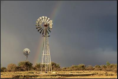 Farm dam windmill rainbow