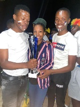 student holding cup