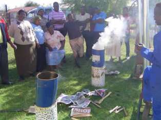 Description: Community Engagement Keywords: Basa, Magogo, technique, fire, coal, Basa Mama, light up, grandmother