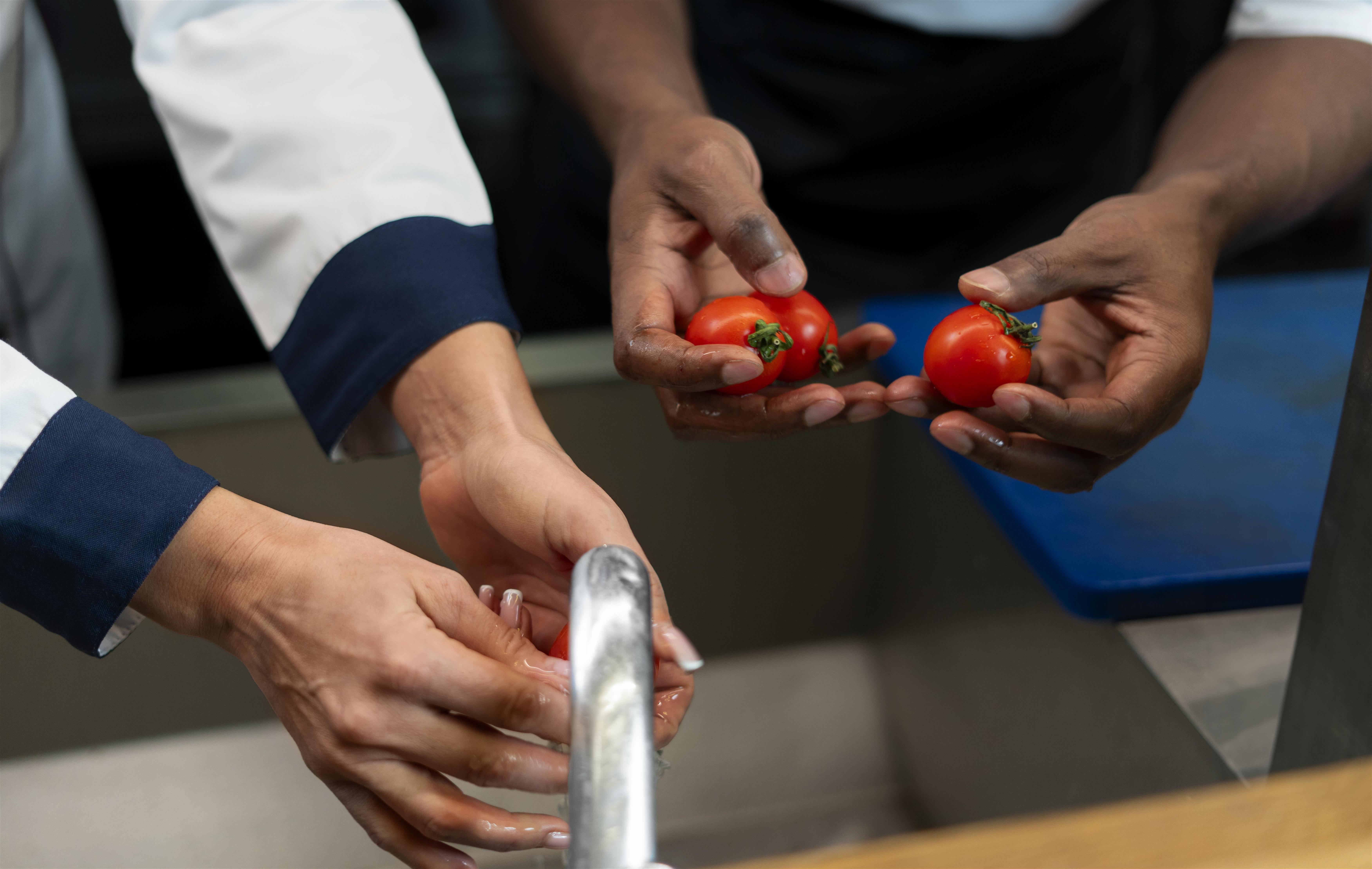 chef-cooking-kitchen-while-wearing-professional-attire